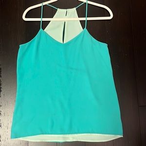 Reversible teal top. Size small